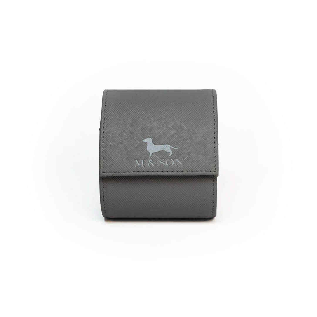 grey leather watch roll with m and son logo on a white background