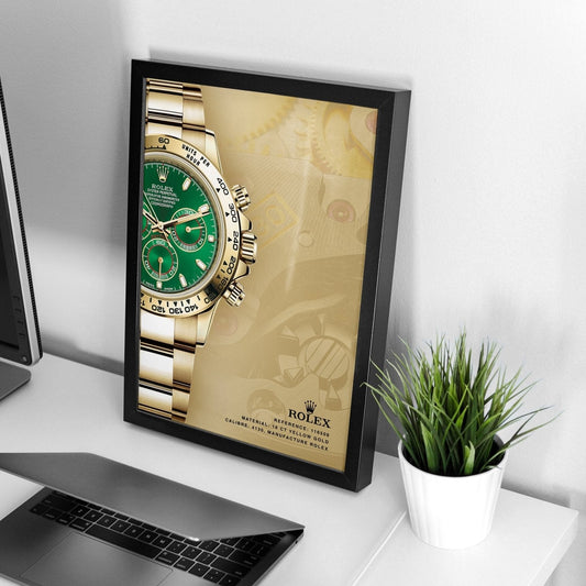 Rolex Daytona John Mayer framed watch poster displayed on a desk