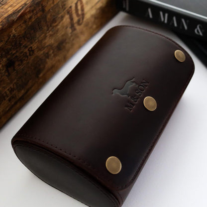 M and Son, double leather watch roll with embossed logo showing the side view.
