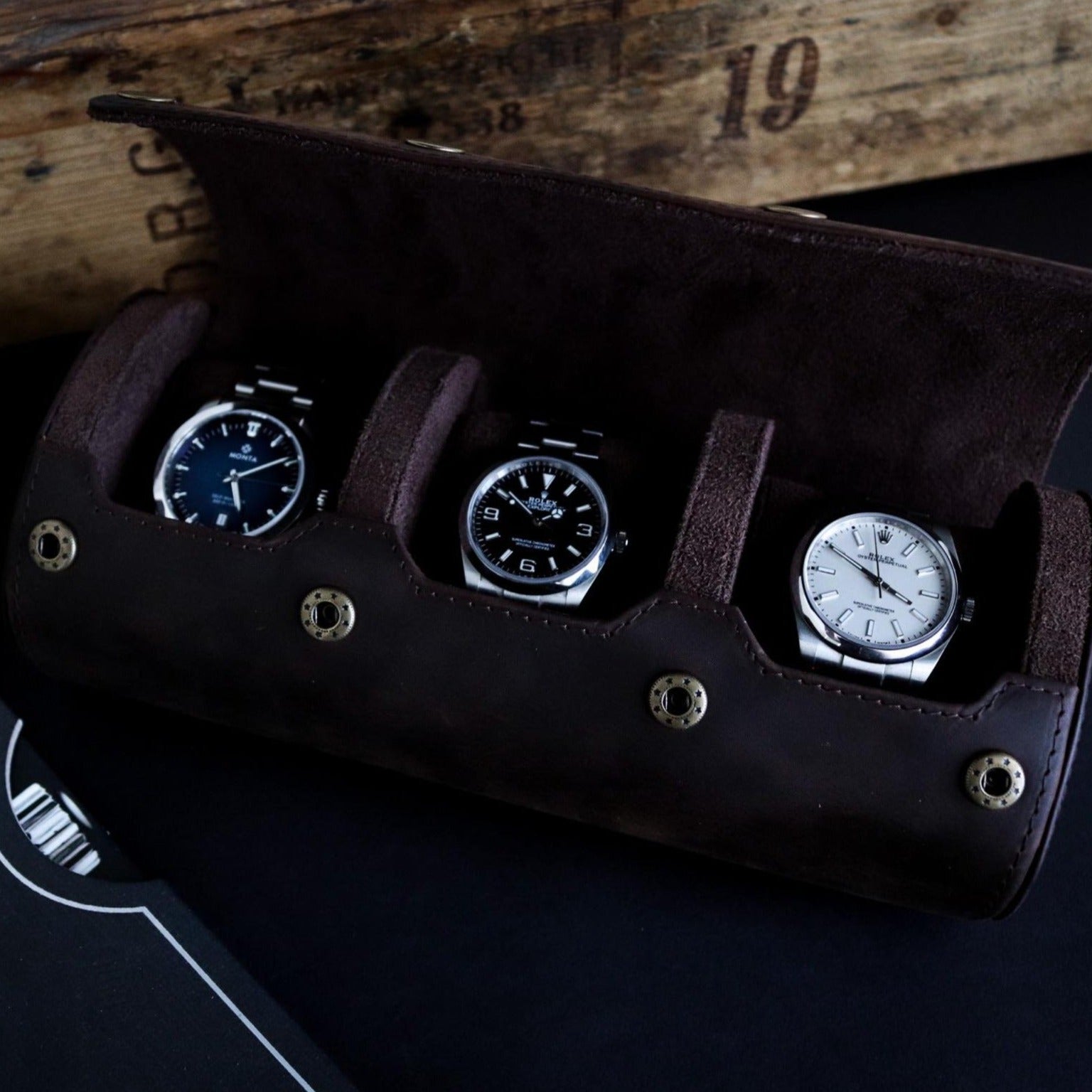 M and Son triple leather watch roll, showing rolex explorer, rolex oyster perpetual and the monta noble inside.