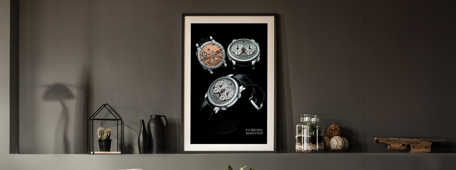 Framed artwork of an f p journe watches on a dark wall with decorative items.