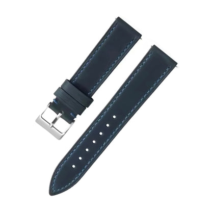 Navy blue leather watch strap with silver buckle on a white background