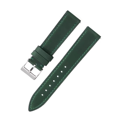 Green leather watch strap with silver buckle on a white background