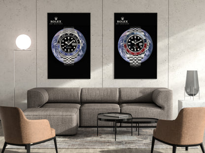Two Rolex posters on a wall above a gray sofa in a living room.
