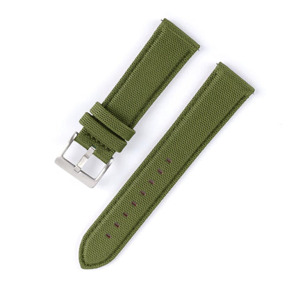 Green watch strap with silver buckle on a white background