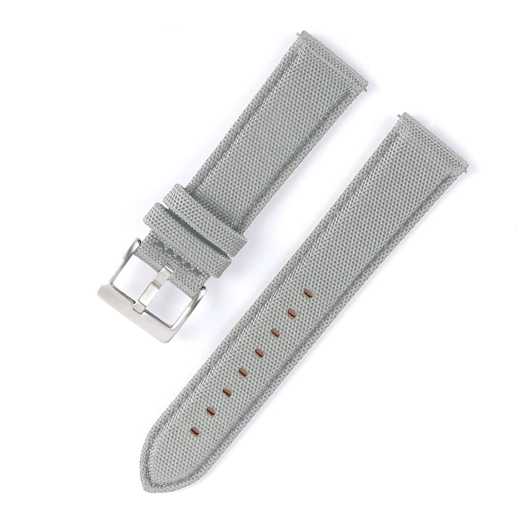 Gray watch strap with metal buckle on a white background